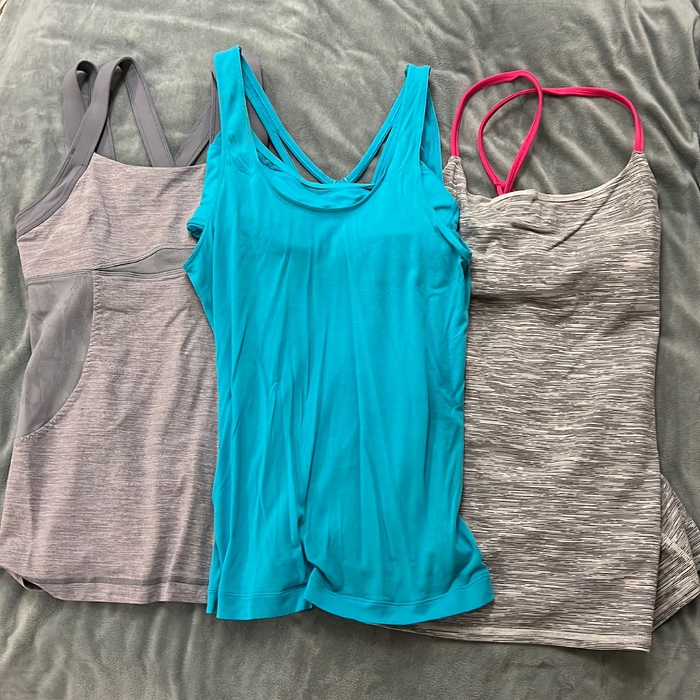 3 size 6 lululemon tank tops